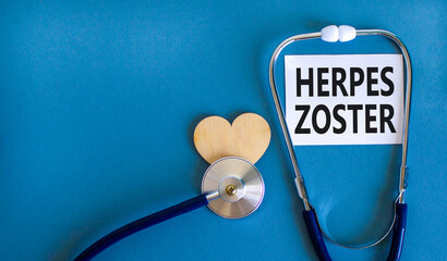 Herpes zoster symbol. Concept words Herpes zoster on beautiful white card. Wooden heart and...
