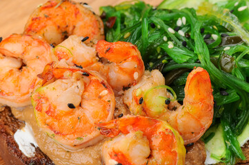 shrimp with seaweed avocado on toast macro photo