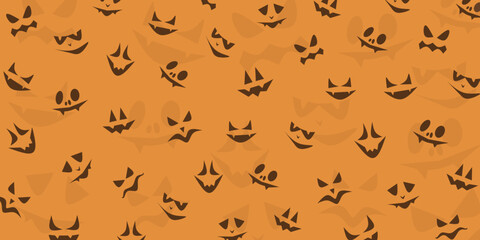 Halloween pattern with spooky pumpkin monster faces in black silhouette style scattered on orange background creating a creepy festive design for holiday decoration textile and wrapping paper