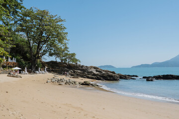 Praia do Curral beach in Ilhabela, Sao Paulo, Brazil on a sunny day with no clouds