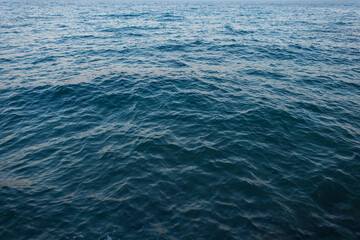 Deep blue sea with soft waves and natural texture, ideal background for marine, travel, and summer design concepts. Croatia, Opatija. Summer holidays