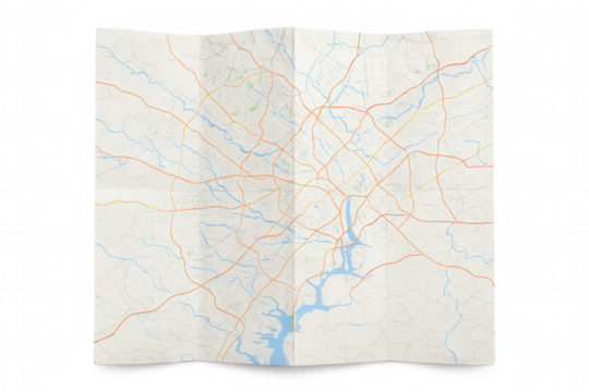 Paper road map folding, displaying colorful route lines, geographic features on transparent background