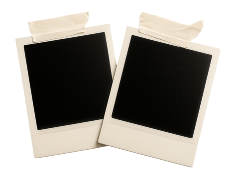 Two polaroid photo frames with tape strips.