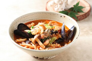 Spicy Korean seafood soup with beech mushrooms, a flavorful and warming dish created by master chef Hanshunseop.