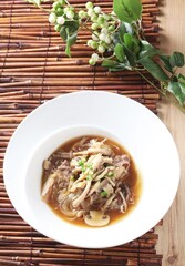 Close-up of Korean oyster mushroom bulgogi stir-fried with soy sauce, onions, and vegetables, a savory dish by master chef Hanshunseop. Photographed in Korea.
