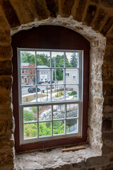 window in the wall in th old stone mill