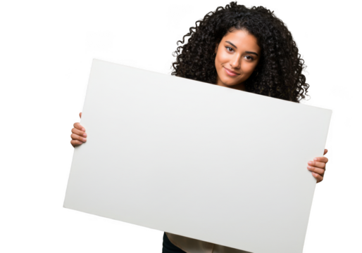 Young woman with curly hair holding a blank white sign isolated on transparent background - Powered by Adobe