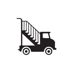 Fototapeta premium Simple black and white illustration of a truck with an exterior stairway.A side view of a simple, black and white silhouette of a truck with an exterior stairway.