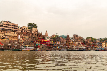 Tourists Visiting Varanasi Ghats on Ganges River in India