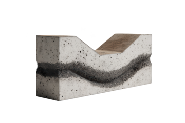 Concrete block with wavy, dark inlay. Angular shape. Solid and sturdy appearance
