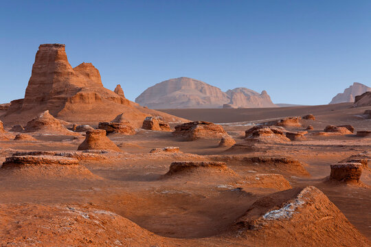 Rock formations known as Kalutes in the Lut Desert, in Iran