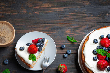 Sponge cake with whipped cream and fresh berries