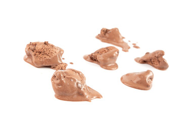 Melted chocolate ice cream isolated, real melting cocoa icecream drops, chocolate ice stain