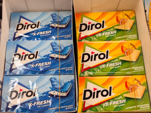 Dirol X-Fresh Sugar-Free Chewing Gum Packages in Blue Mint and Orange Tropical Flavors Displayed on Store Shelf, Dnipro, Ukraine - June 21, 2025