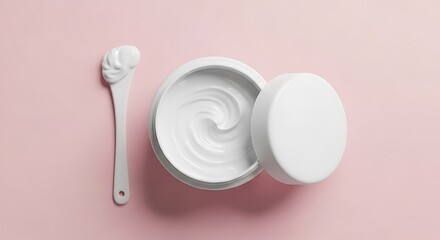 Cosmetic cream and spoon on pink background