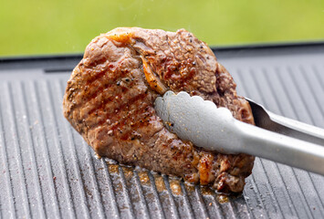 freshly grilled beef ribeye steak