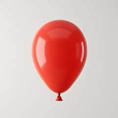 A vibrant red balloon floats against a clean, minimalist white background, a simple celebratory image.