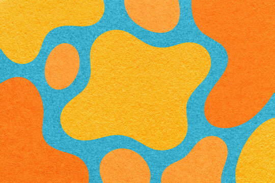 Abstract yellow, turquoise and orange background with amorphous shapes and spots, paper texture in flat organic design