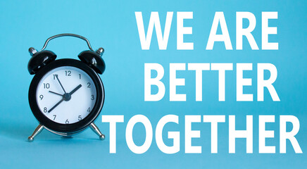 Tell us your story symbol. Beautiful blue background with alarm clock with words Tell us your story. Business and Tell us your story concept. Copy space.