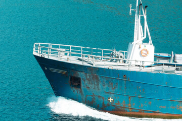 Front of a cargo ship in the sea