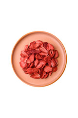 Dried sublimated slices of strawberry as an ingredient for sweet desserts. Dried strawberry