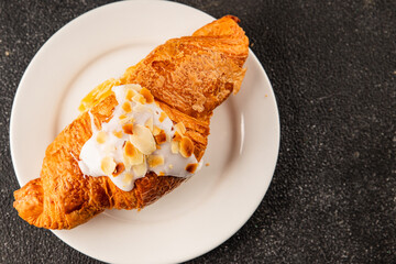 Croissant almond freshly baked sweet dessert tasty snack fresh delicious gourmet food background on the table  rustic food top view copy space