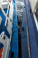 two motor ships are moored to each other