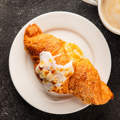 Croissant almond freshly baked sweet dessert tasty snack fresh delicious gourmet food background on the table  rustic food top view copy space