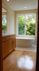 Fototapeta premium A serene and luxurious bathroom space features a large window with a view, inviting natural light and a sense of spaciousness.