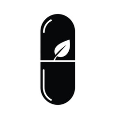 Black capsule with white leaf pill medicine