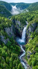 Waterfall cascading through a lush valley