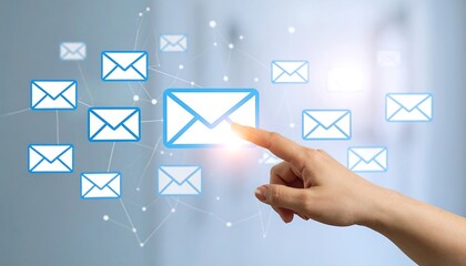 Hand interacts with digital email icons, network concept