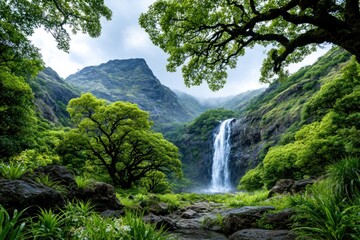 Obraz premium Lush waterfall cascading through mountains