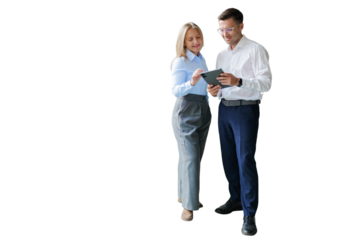 Business people colleagues engaged in discussion while reviewing plans on a tablet