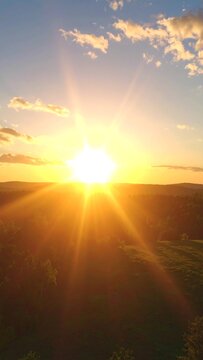 Sunrise over rolling hills (1)
