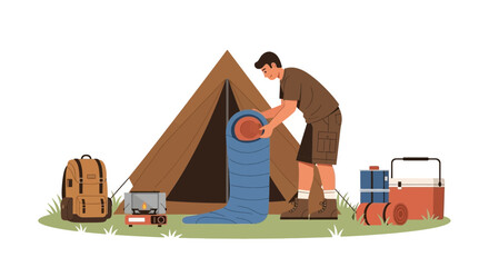 Man Packing Sleeping Bag Next to Tent, Outdoors Adventure Lifestyle