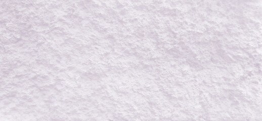 Light purple background with a slight rough stone texture. Copy space 