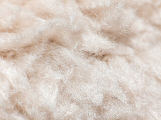 Close up of soft beige wool fiber texture background