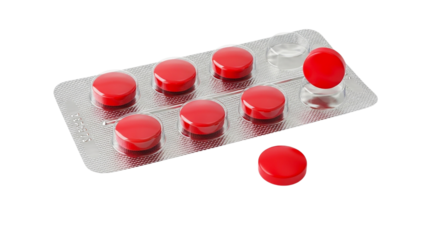 A blister pack of red pills with one pill removed and placed next to the blister