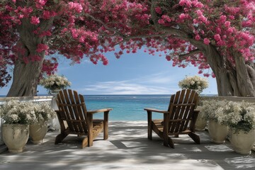 Fototapeta premium A serene outdoor setting features two wooden chairs nestled beneath vibrant pink blooms, offering a stunning view of the calm ocean on a sunny summer day