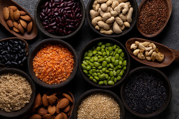 healthy eating options, bright flat lay of grains, legumes, nuts, and seeds, offering natural textures for a healthy lifestyle