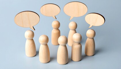 Wooden figurines arranged in a circle, each with a blank speech bubble above, symbolizing communication and discussion