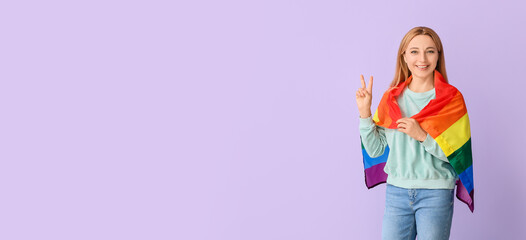 Woman with LGBT flag on color background