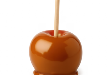 Caramel apple on wooden stick with transparent background