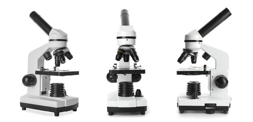 Set of modern microscopes on white background