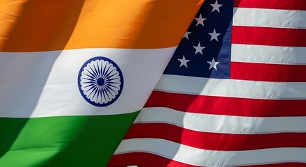 A juxtaposition of the Indian and American flags, symbolizing the diplomatic relations and collaborations between the countries.