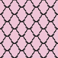Fototapeta premium Chic black bow seamless pattern on pink background, ideal for wallpaper, fabric, wrapping paper, or stylish modern decorative design projects.