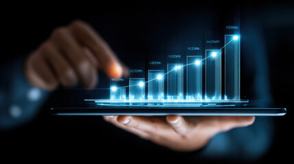 Digital tablet displaying glowing graph with increasing data points, symbolizing growth and progress in technology and business. hand gestures emphasize interaction with data