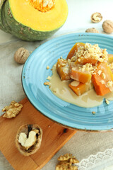 Turkish Pumpkin Dessert with Tahini and Walnut on Plate