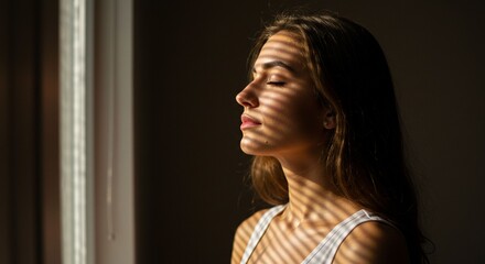 Woman profile portrait sunlight shadows